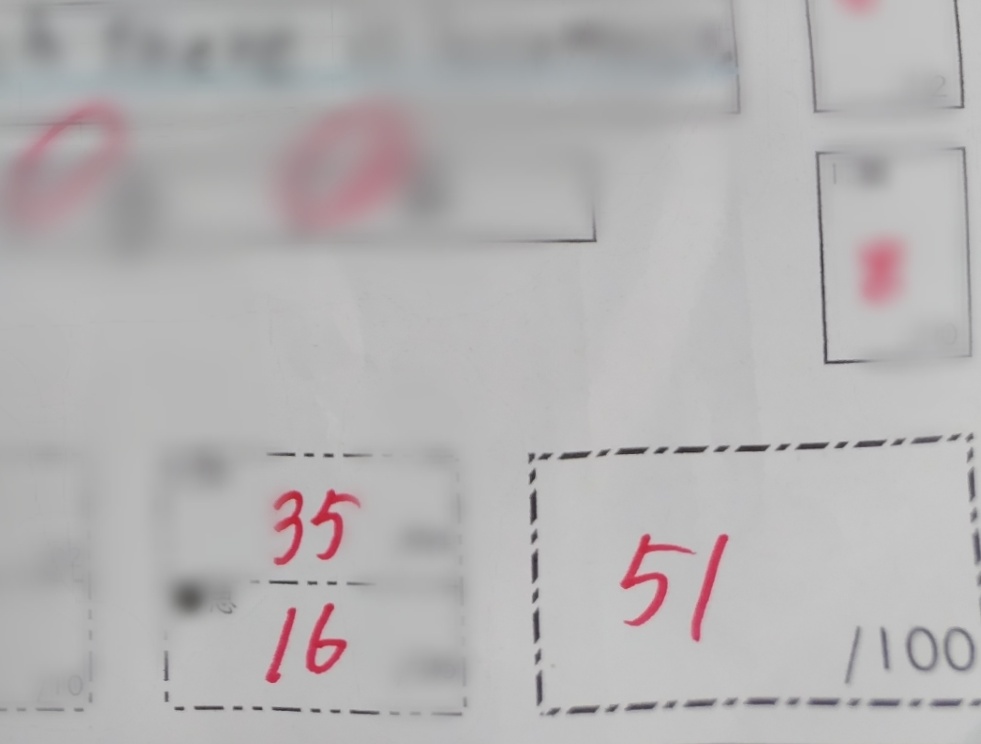 息子、中１うみ　の返却された英語のテスト。後期中間、英語のテスト。51点。